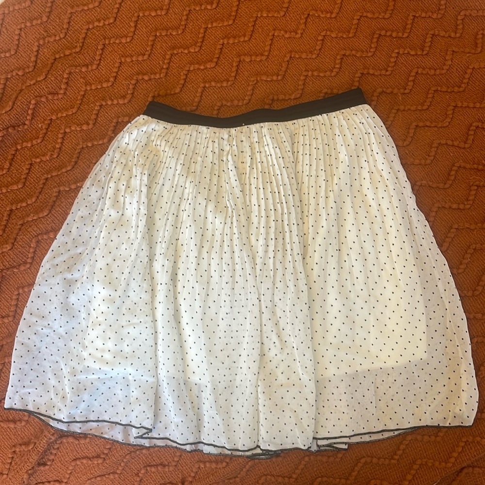 White skirt with black polka dots/hearts